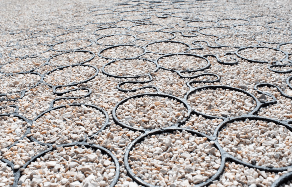 an image showing how to reduce impervious surfaces with permeable pavers