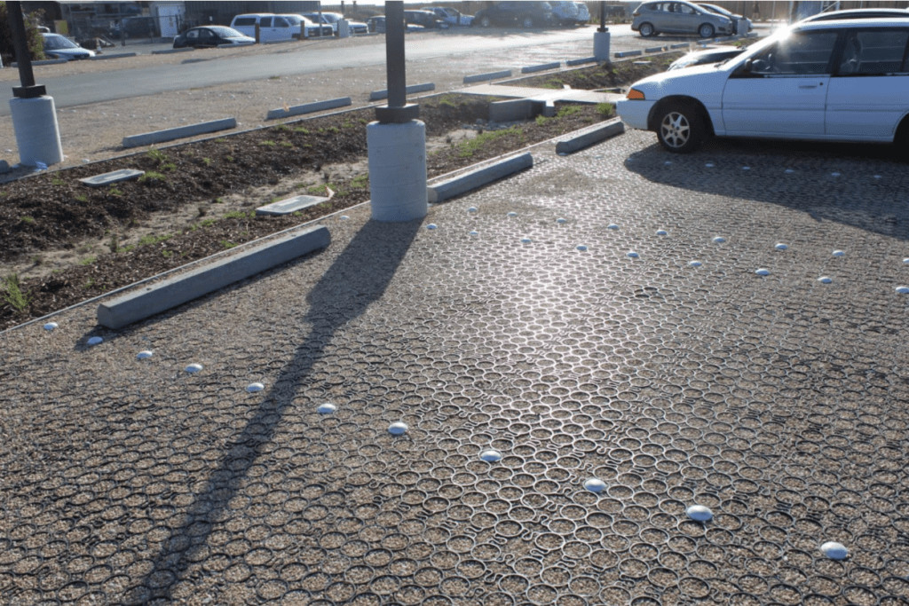 an image of permeable pavers from TRUEGRID® being used in a parking lot