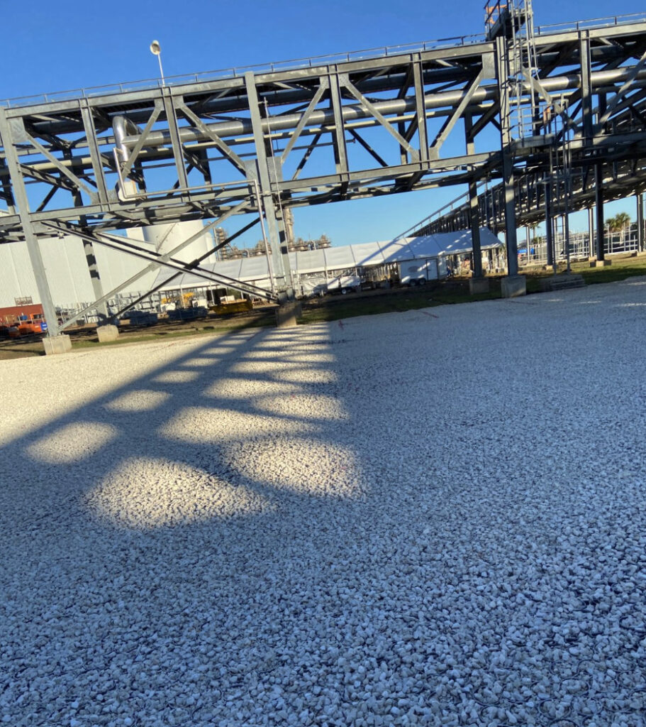 An image of a replacement parking lot using permeable pavers in an industrial area.