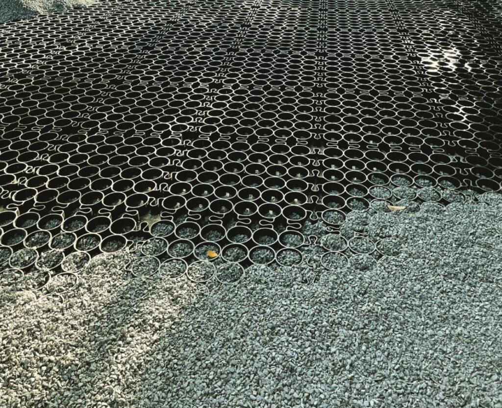 A heated system is being installed under a permeable paver.