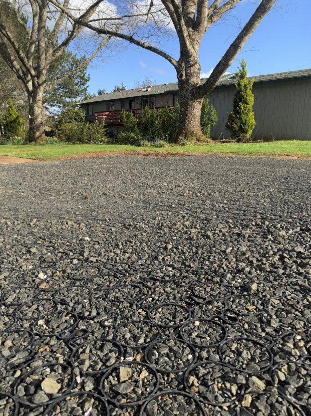 An alternative to tar-and-chip driveway materials.