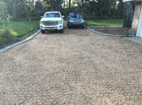 A gravel driveway as an alternative to a wood chip driveway.