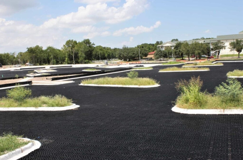 TrueGrid’s permeable paver system installed in a parking lot.