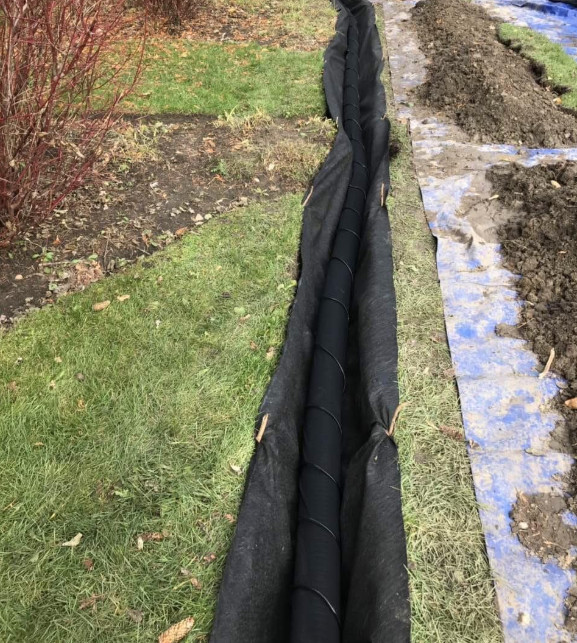 An underground pipe being installed for infrastructure development.