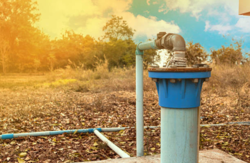 A drainage pipe system installed outdoors for efficient water management.